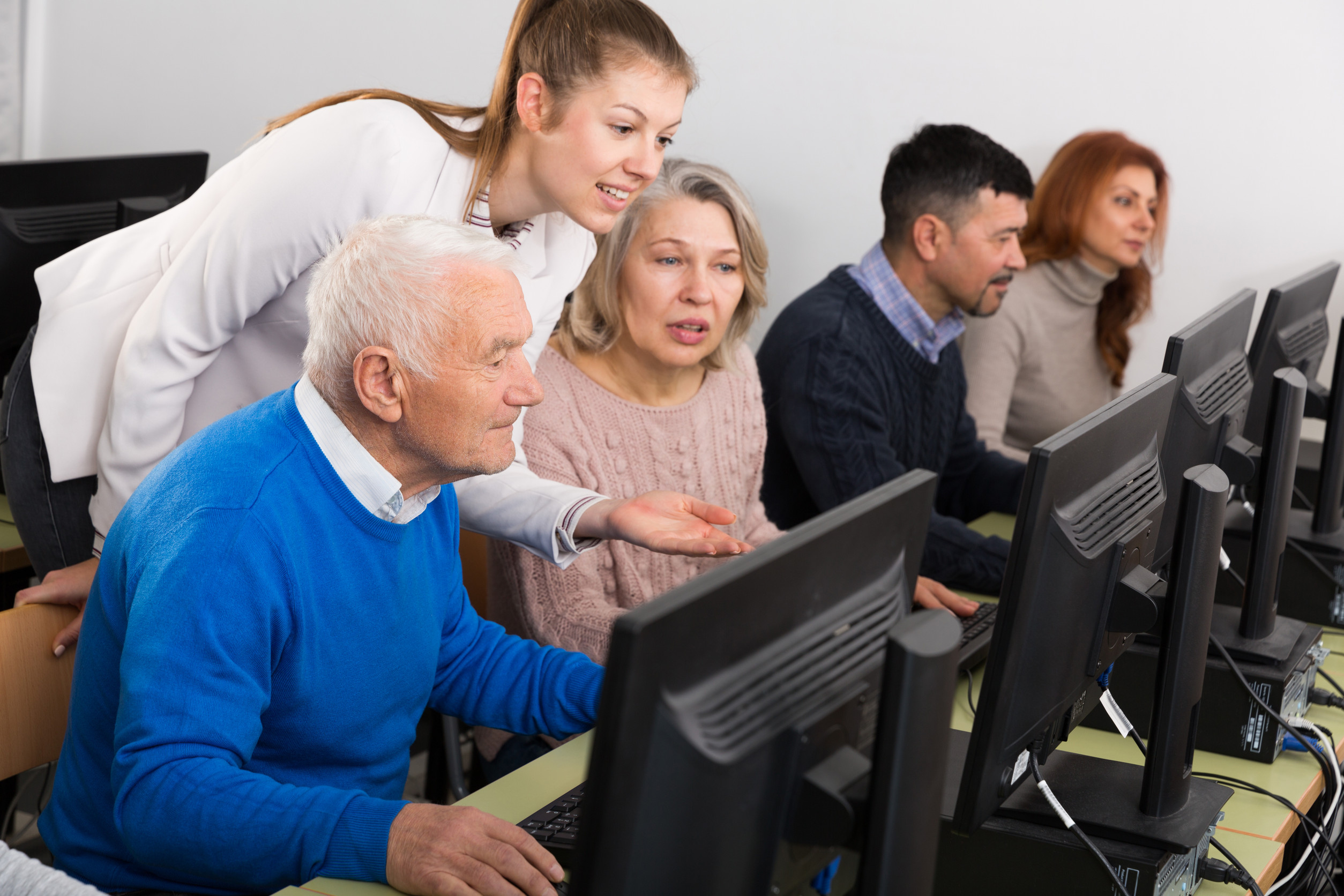 Senior using a smartphone thoughtfully